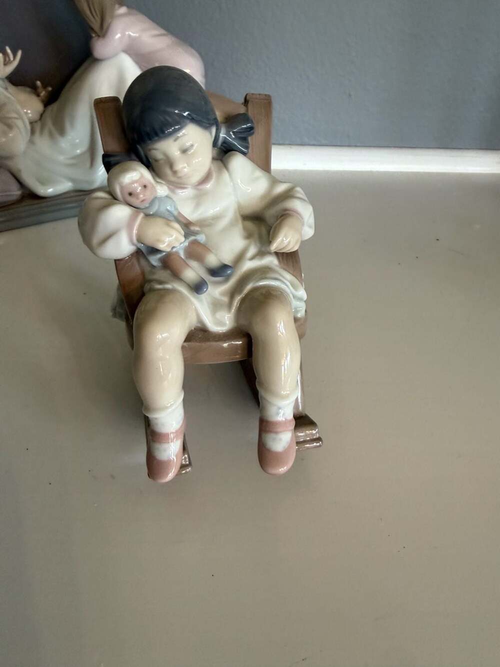 Lladro Porcelain Figurine 5448 Naptime Girl in Rocking Chair Holding Doll
